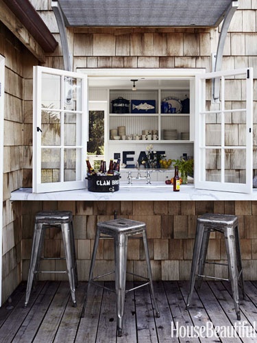 Pass through window over the sink: image via House Beautiful