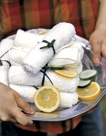 Add special touches like these towels soaked in lemon water and heated in the microwave-image via Country Living