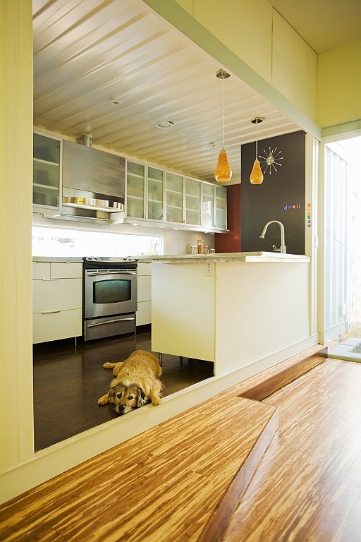 full and modern kitchen in this double wide container-image via modulux